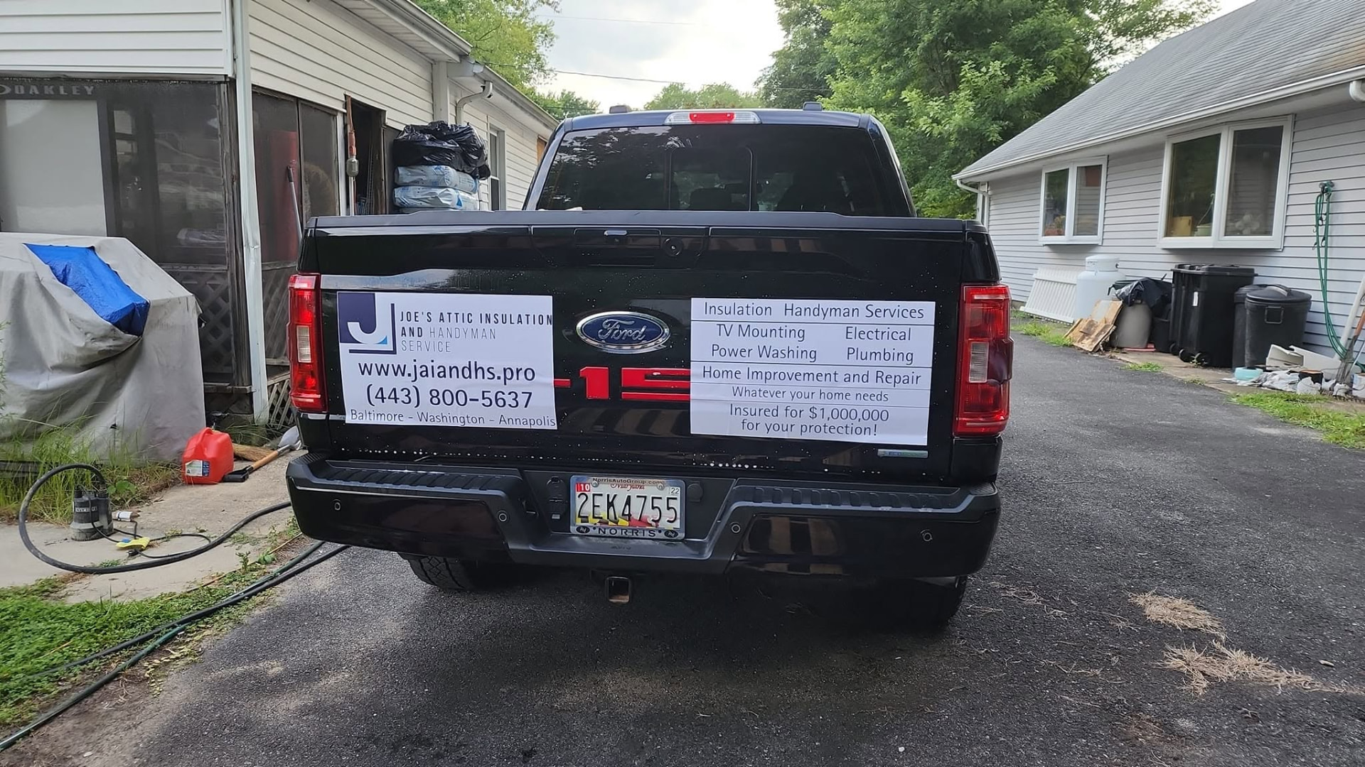 Service list on the rear of Joe's work truck