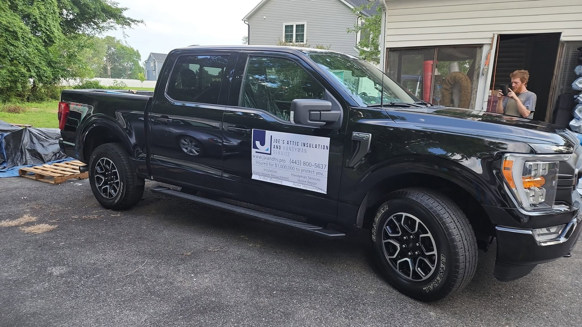 Joe's truck parked at a Maryland insulation job site